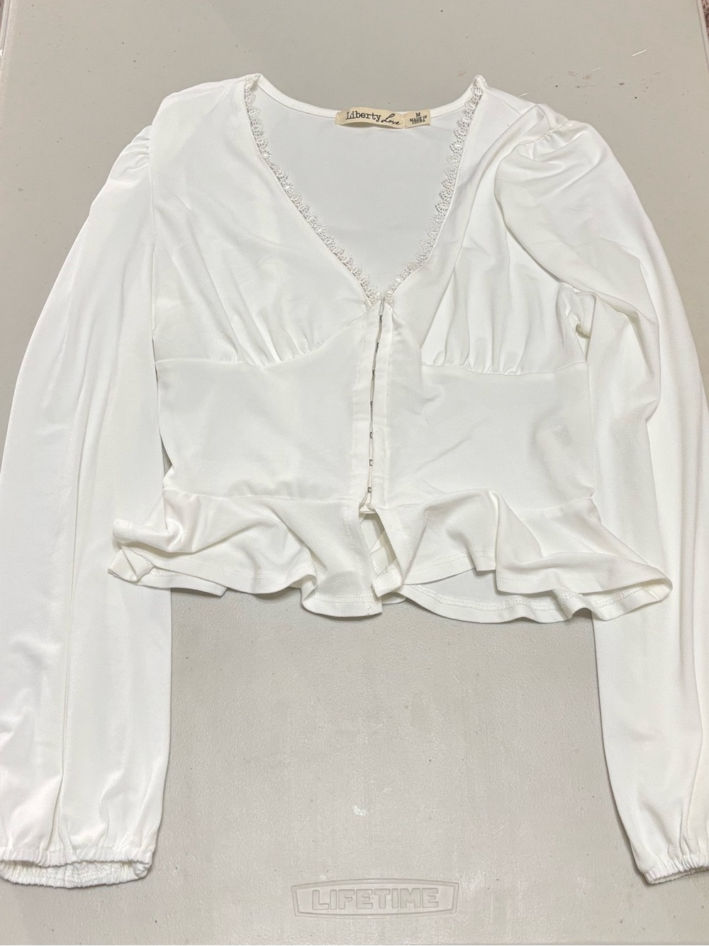 Liberty Love Cream V-Neck Peplum Long Sleeve Blouse